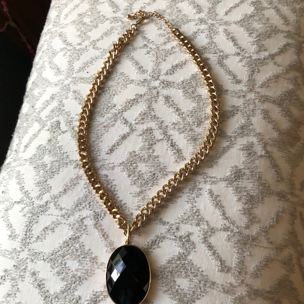 Gold chunky necklace with black pendant